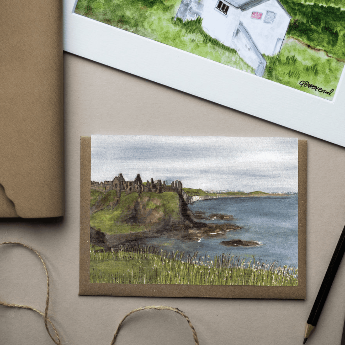 Close-up of the Dunluce Castle watercolour greeting card showing artwork detail.