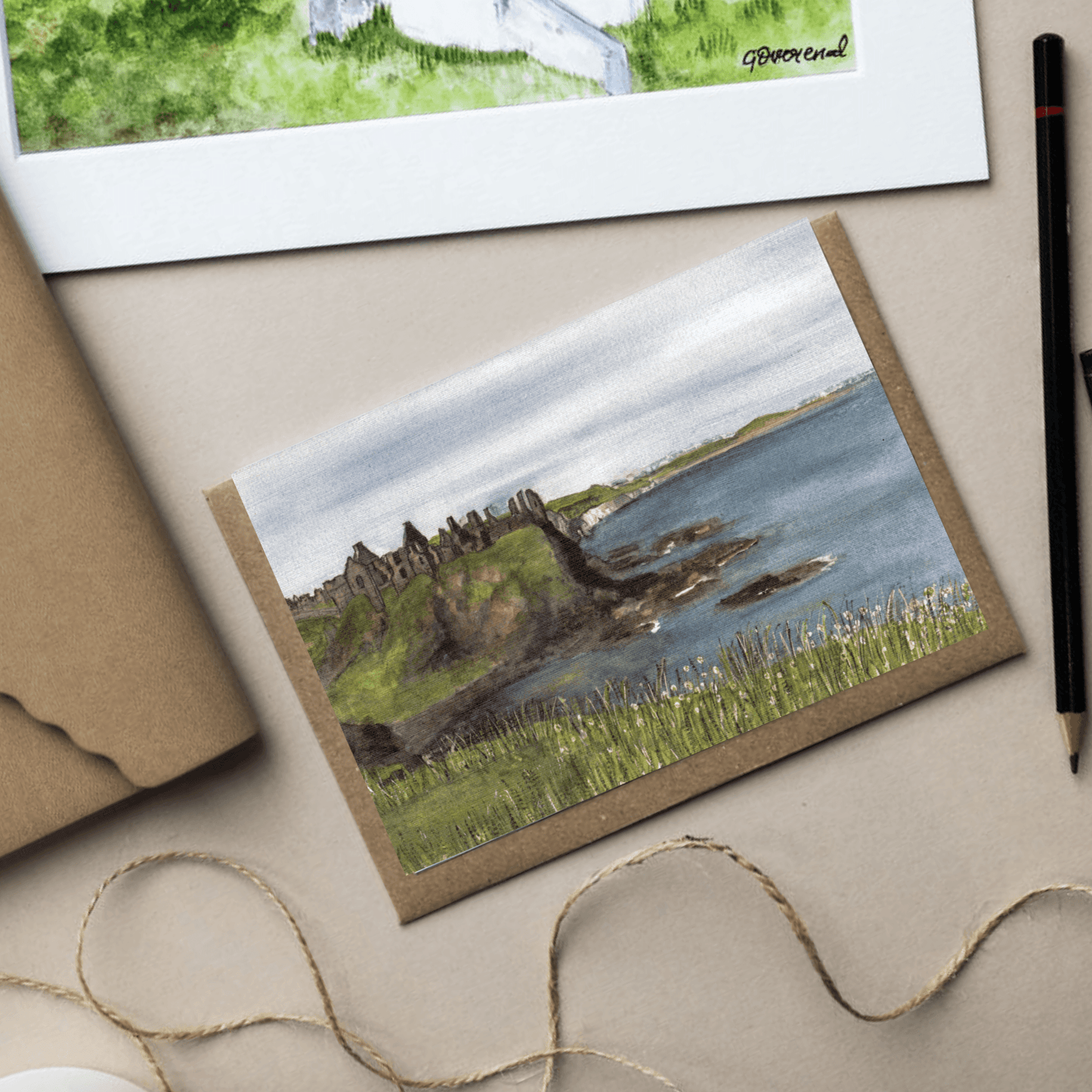 A6 Dunluce Castle greeting card with brown kraft envelope.