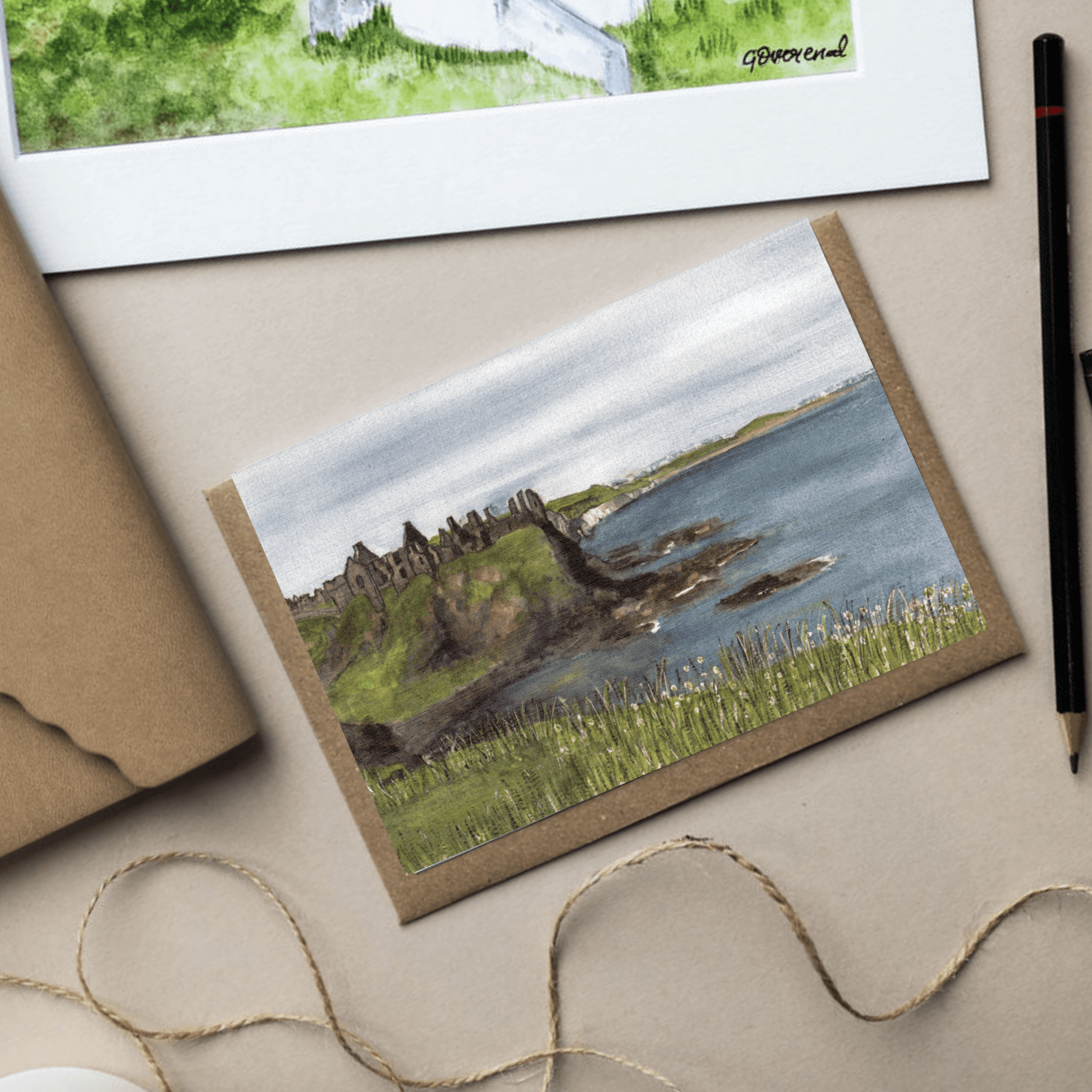 A6 Dunluce Castle greeting card with brown kraft envelope.